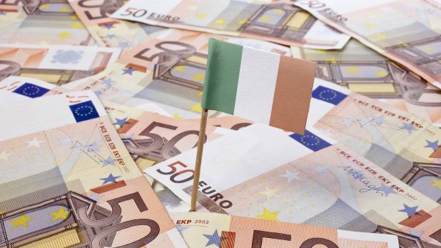Irish Flag on pole stuck into 50 euro notes