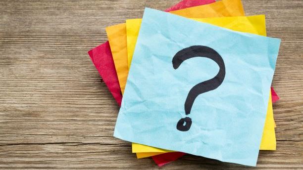 Question mark drawn on sticky notes