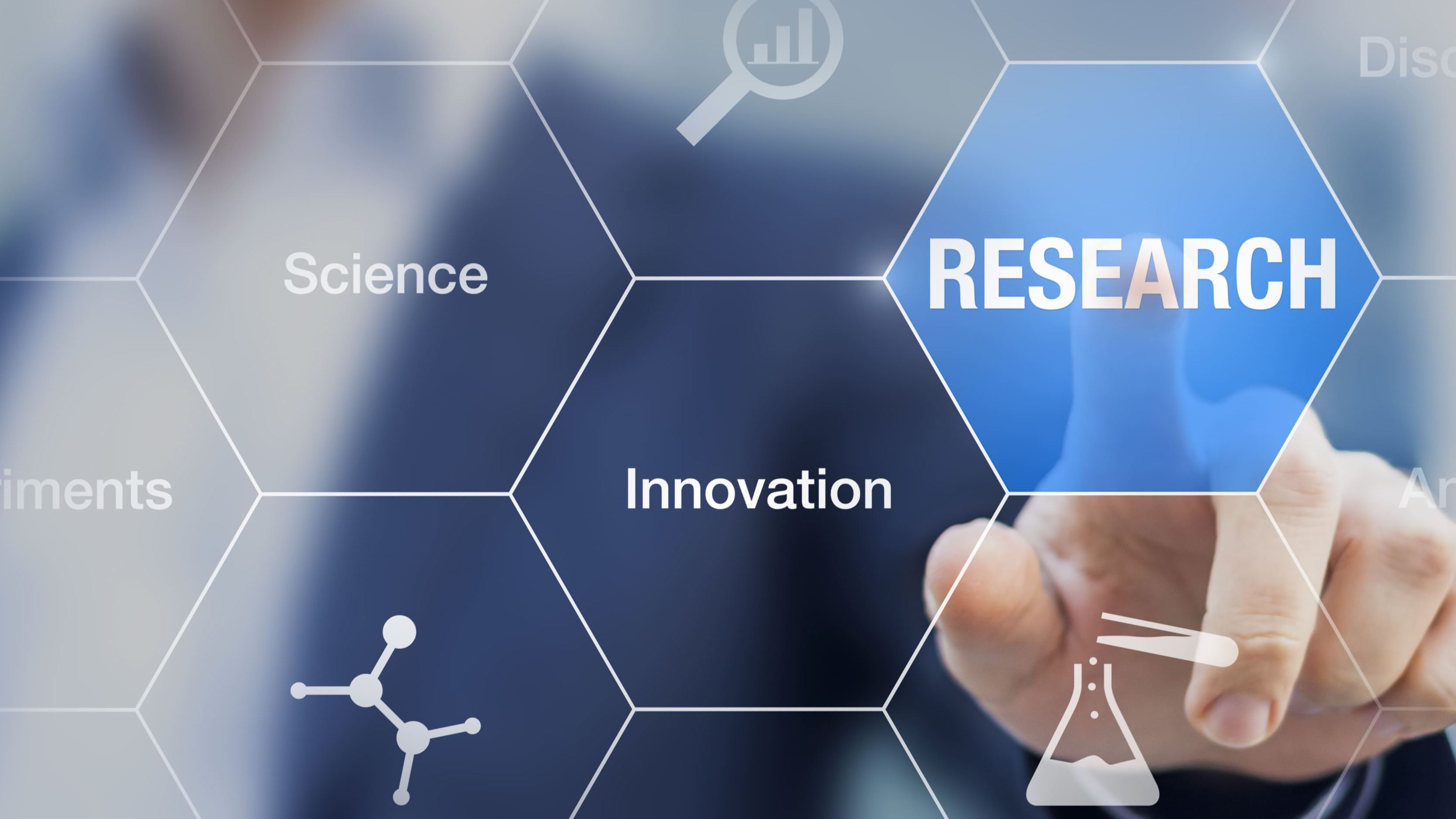 Image showing the words Science, Innovation and Research with a person pointing to Research