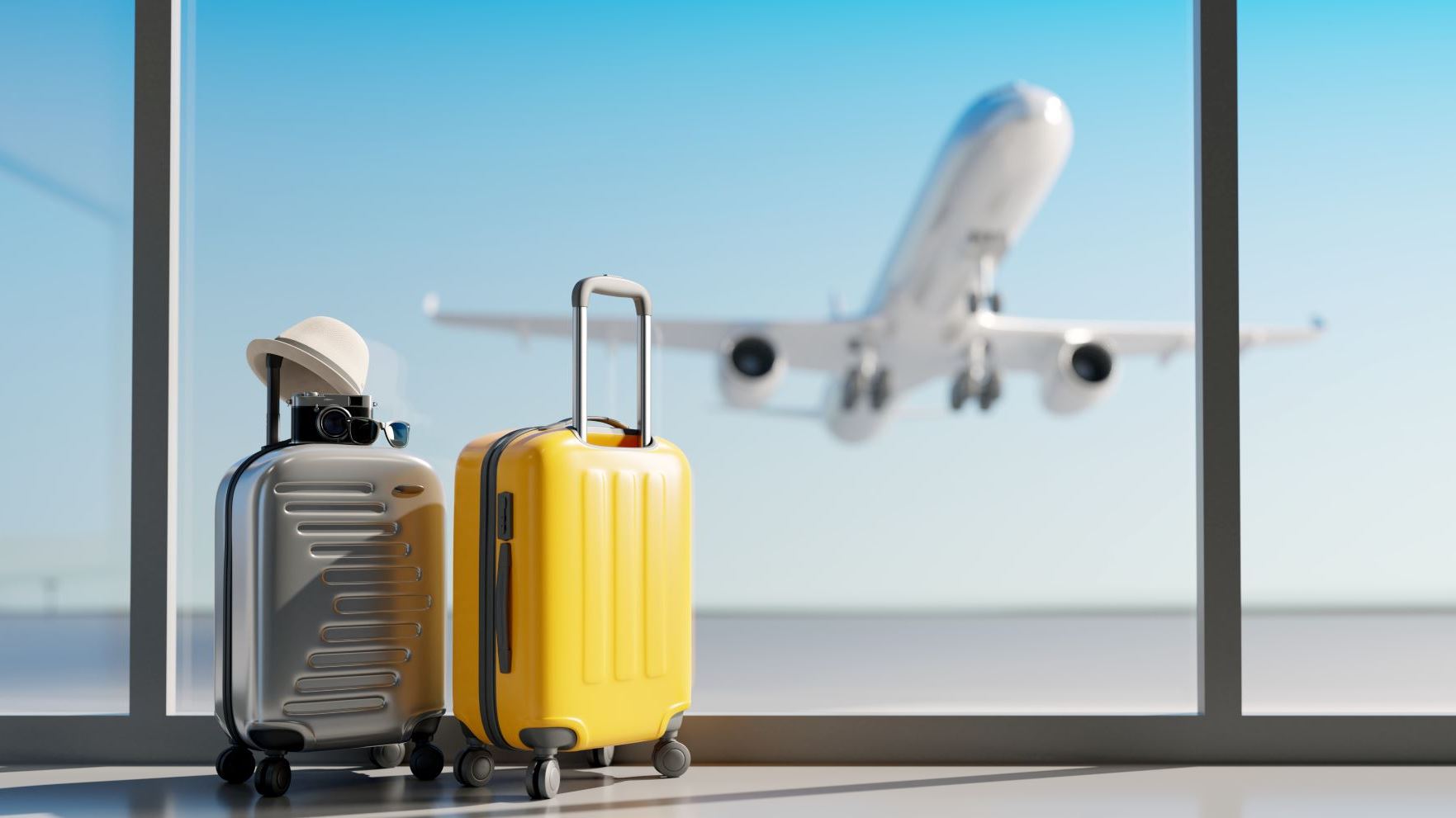 Image of two suitcases and a plane taking off