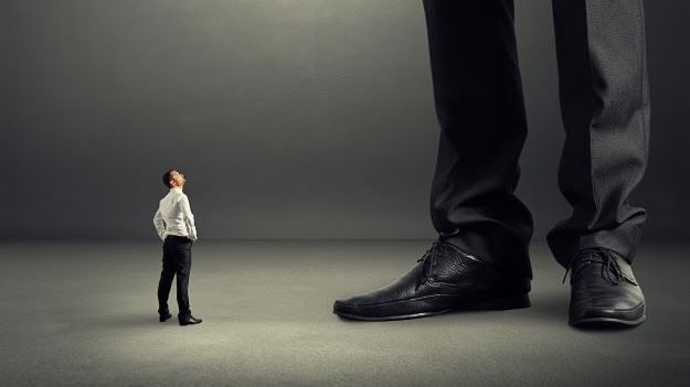 Miniature R&D advisor looking at his big boss